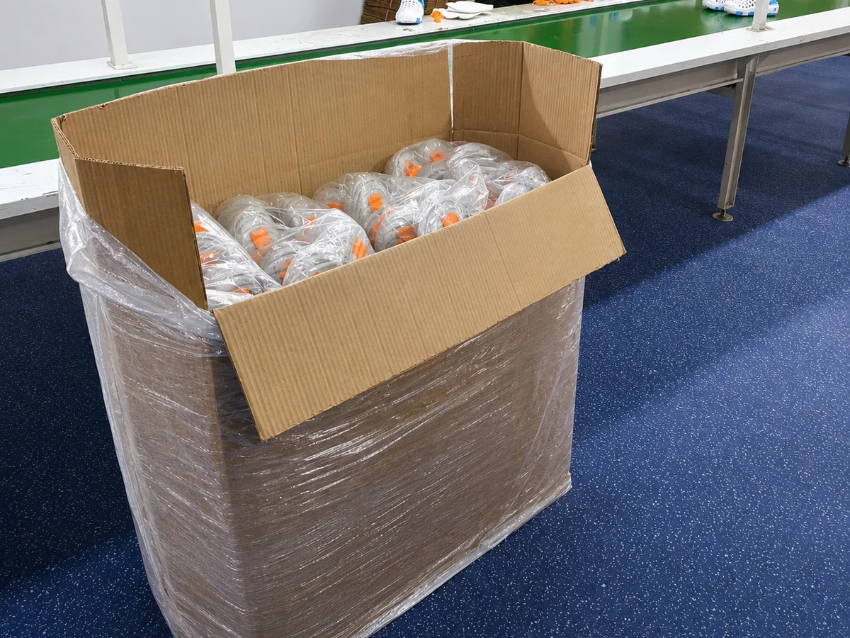 A Slideez carton of loose poly-bagged EVA clogs ready for dispatch
